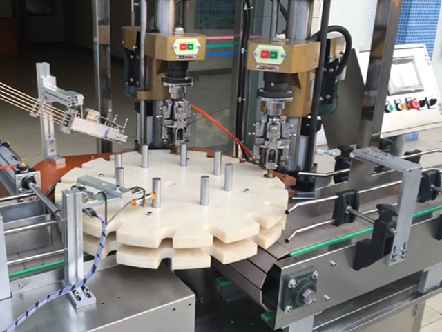 capping head dobbelthodet skrulokk.jpg