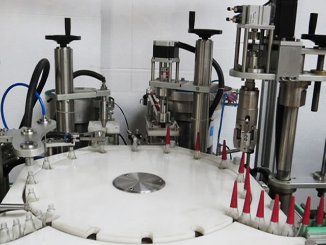 neglelakkfylling rotary capping.jpg