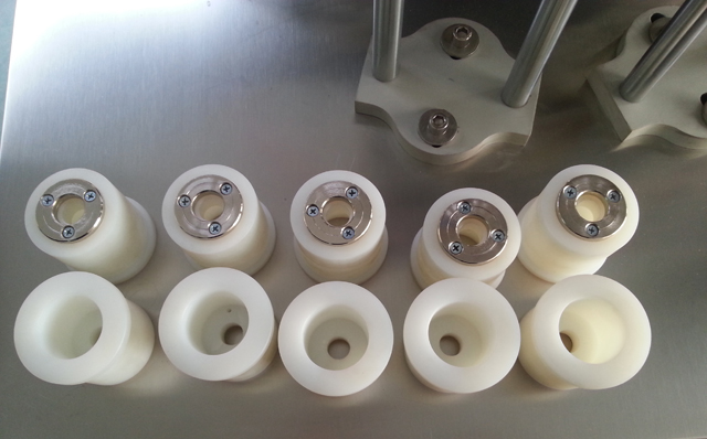 tubes holers form for tube filler sealer.jpg