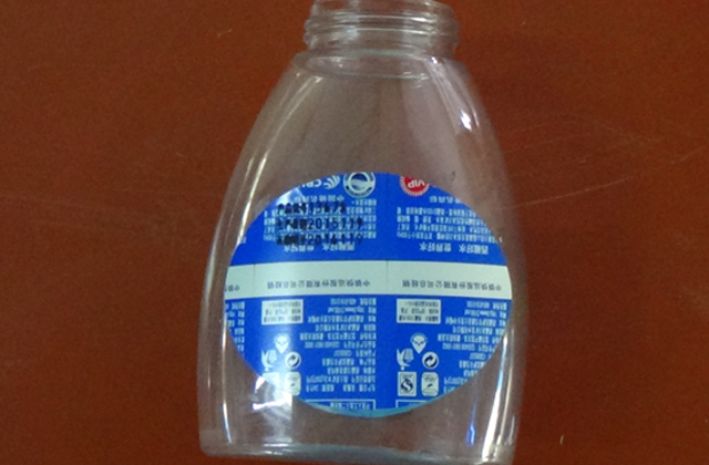 rullende merkemaskin for flate flasker samples.jpg