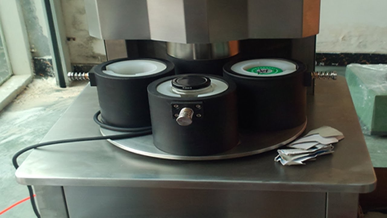 four heads vacuum capping machine semi automatic vakuumkappe manual.jpg