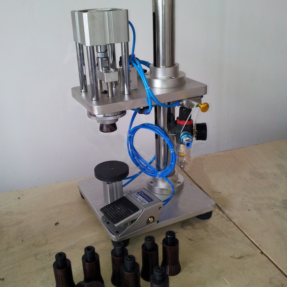 manual crimping machine for glass bottles pneumatisk dekselutstyr semiautomatisk pneumatisk.jpg